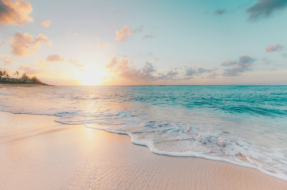 Calm beach at sunrise