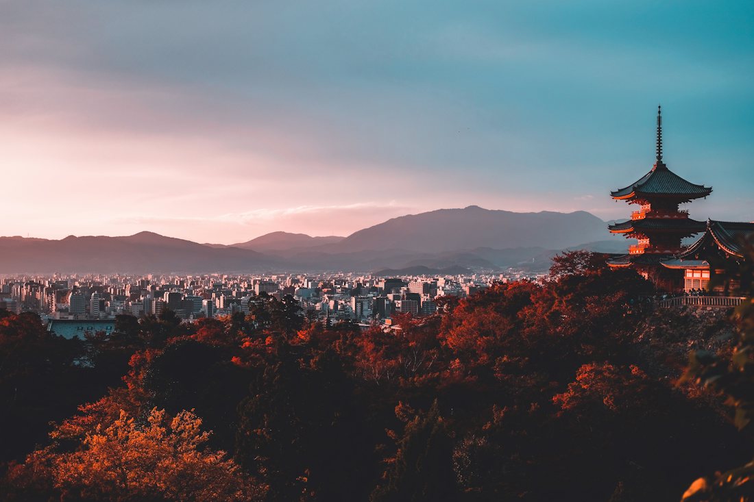 Kyoto pagoda above the city at sunset