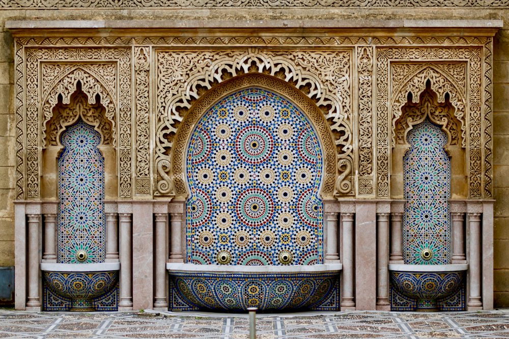 Hand-cut zellige tilework in a Moroccan courtyard